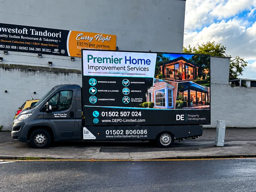 The digivan showing a DE Property Development advert for premier home improvement services